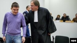Russian national Vladimir Drinkman (left) was arrested in Amsterdam in 2012 and extradited to the United States earlier this year. (file photo)