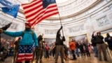 U.S. -- Supporters of US President Donald J. Trump in the Capitol Rotunda after breaching Capitol security in Washington, DC, USA, 06 January 2021.