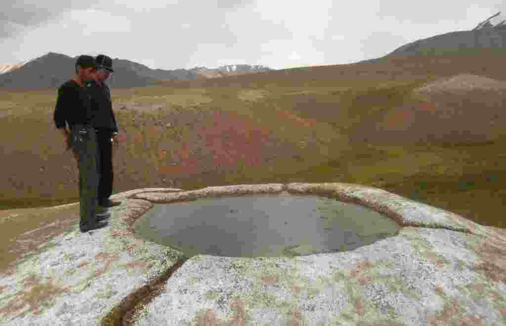 A pool at the Bakpur-Ata shrine. Kyrgyz debate the origins of the holy site. Some say it&#39;s named after a relative of the Kyrgyz hero Manas, while others say its name comes from Babur, the founder of the Mogul Empire in the 16th century. 