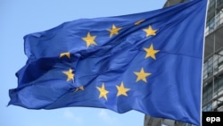 France -- The EU flag flies outside of the European Parliament in Strasbourg, June 30, 2014