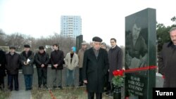 Friends and family pay tribute to Elmar Huseynov in Baku on the fourth anniversary of his murder.