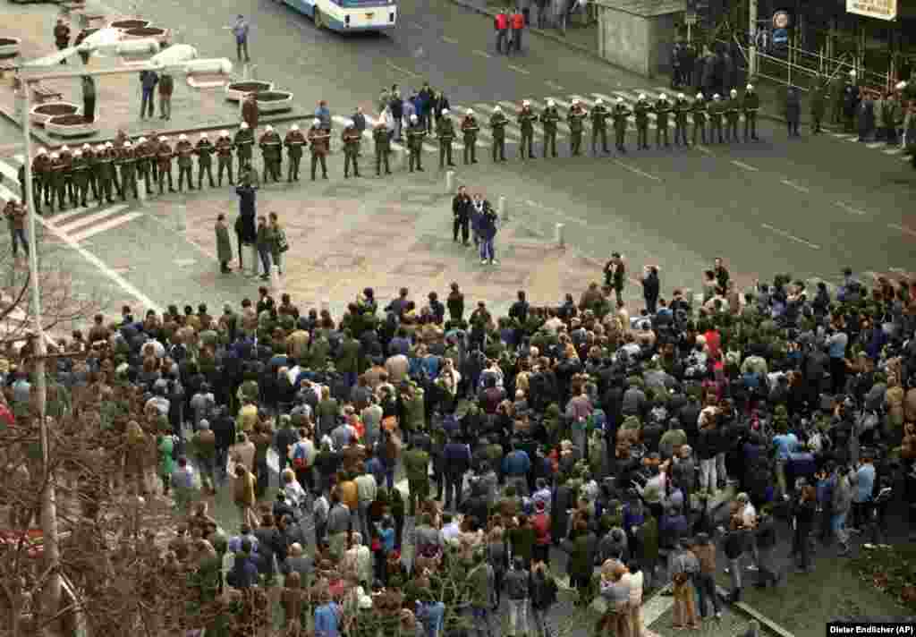 Riot police officers get ready to disperse demonstrators on Wenceslas Square on January 15, 1989, as a crowd of about 2,000 gathered to commemorate Palach&#39;s death.&nbsp;