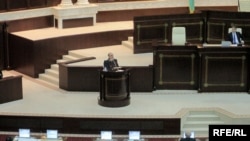 Prosecutor-General Zakir Qaralov addresses the parliament.