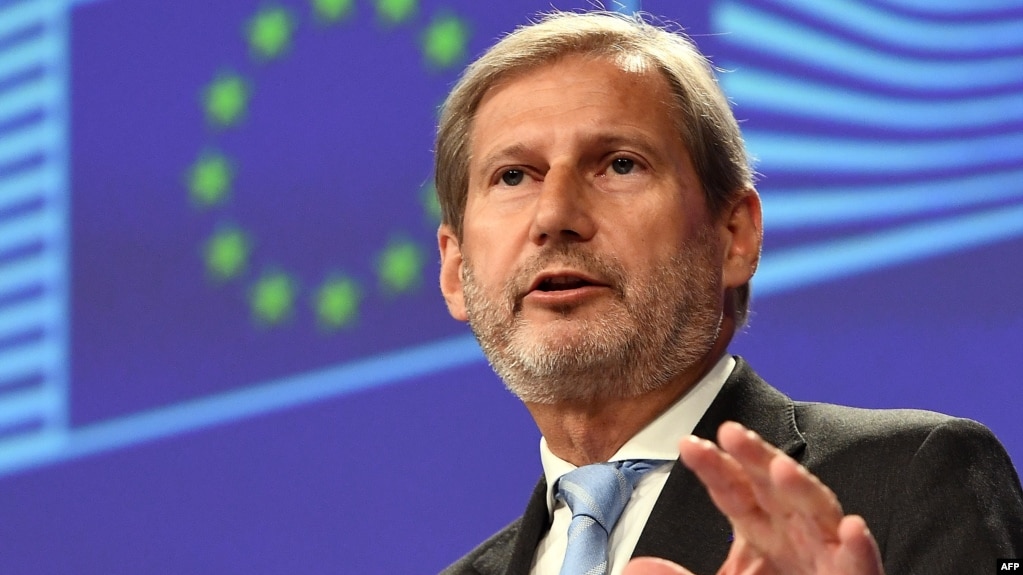 EU Enlargement Negotiations Commissioner Johannes Hahn speaks at a news conference in Brussels on June 12.