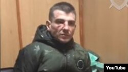 A man identified as Vitaly Chikiryov as seen in a video posted by the Investigative Committee.