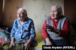 Yauheniya still receives regular visits from her sister Branislava (right).