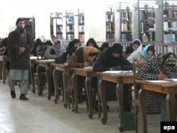 Afghan girls take a university admissions test in Kabul.