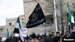 An Al-Qaeda flag flying in Syria's Idlib Province, where Syria's Al-Qaeda affiliate is strong.