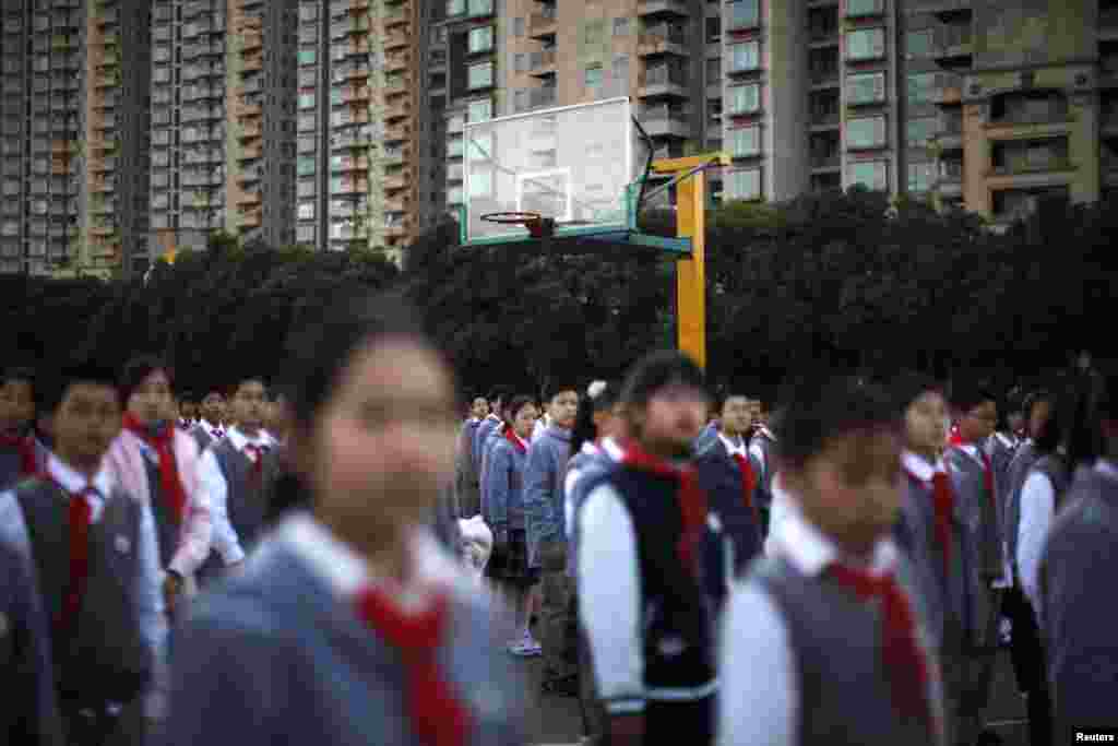 Pioniri škole u Šangaju, 5. novembar 2012. Foto: REUTERS / Carlos Barria