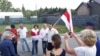 Павал Сяверынец (у цэнтры) падчас пратэсту актывістаў супраць рэстарацыі «Поедем поедим» у Курапатах. 18 ліпеня 2018 году