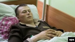 Aleksandr Aleksandrov, one of two captured Russian soldiers, in a Kyiv hospital on May 19.