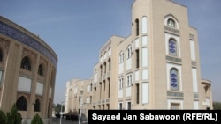 Students walk on the campus of Khatam-al Nabyeen Islamic University 