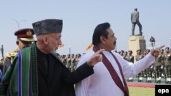 Președintele Mahinda Rajapaksa primindu-l pe omologul său afgan în martie 2014