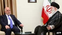 Iranian Supreme Leader Ayatollah Ali Khamenei (right) meets with Iraqi Prime Minister Haidar al-Abadi in Tehran on June 2015.