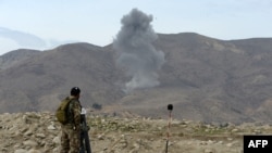 Smoke rises after an air strike by U.S. aircraft on positions during an ongoing an operation against Islamic State (IS) militants in Kot district of Nangarhar province, February 16, 2017