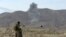Smoke rises after an air strike by U.S. aircraft during in Afghanistan in 2017