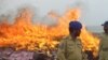 Afghan Refugees In Tajikistan, Human Drug Mules, And A Pakistani Village Fights Back: RFE's Stories Of The Year (Part 2 Of 3)