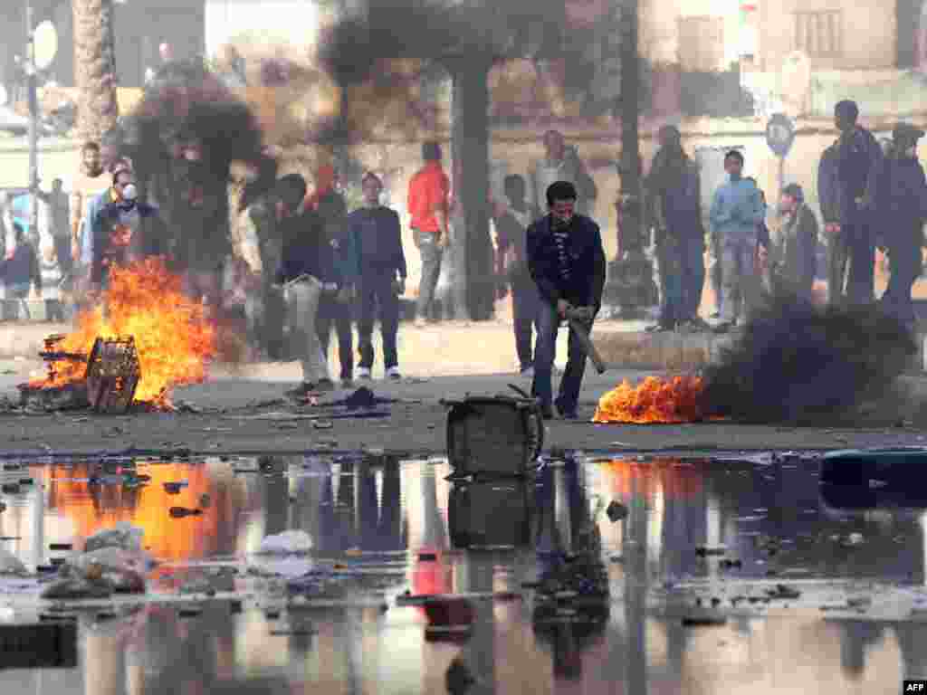 Demonstrators burn tires during a demonstration in the Suez on January 27.