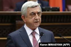 Serzh Sarkisian attends a session of parliament in Yerevan on April 17.