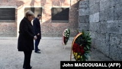 Немис канцлери Ангела Меркел жана Польшанын премьер-министри Матеуш Моравецкий, Освенцим, 6-декабрь 2019-жыл.