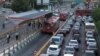 Cars in a traffic jam in Tehran as buses move faster in their separate lane. File photo