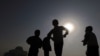 Afghan kids play at Nader Khan Hill overlooking Kabul on November 22. Children may be safer in the Afghan capital than in London or New York despite a deadly nine-year Taliban insurgency, NATO's top civilian representative in the country has said. <br /><br />Photo by Marai Shah for AFP