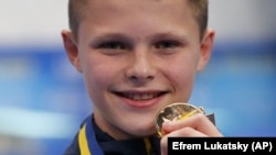 Thirteen-year-old Ukrainian aquatics diver Oleksiy Sereda