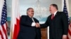 Secretary of State Mike Pompeo, right, shakes hands with Bahrain Foreign Minister Khalid bin Ahmed Al Khalifa, Wednesday, July 17, 2019, during their meeting at the State Department in Washington. (AP Photo/Jacquelyn Martin)
