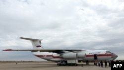 A Russian plane at Baghdad's airport after carrying 37 tons of humanitarian aid for people displaced due to violence across Iraq. On October 23, Russia's Ministry of Defense announced that Moscow had provided humanitarian assistance to Iraqi Kurds in Irbil suffering from IS-related violence. 