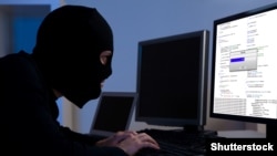 Hacker hacking a computer (Shutterstock) 