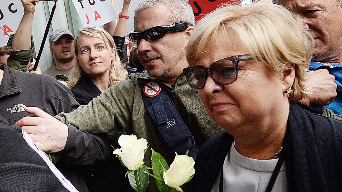 Poland's Top Judge Defies Retirement Law