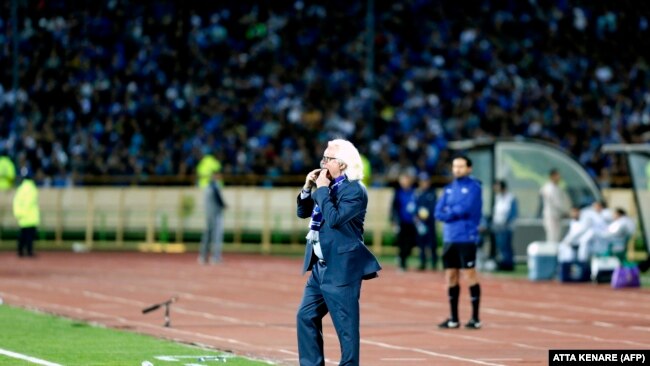 Esteqlal's German head coach Winfried Schafer yells instructions to his players during the AFC Asian Champions League group D football match on March 12, 2018, at the Azadi Stadium in Tehran.