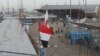 Iraq's and Iran's flags are seen at the Shalamcha Border Crossing, Iraq November 4, 2018. REUTERS/Essam al-Sudani