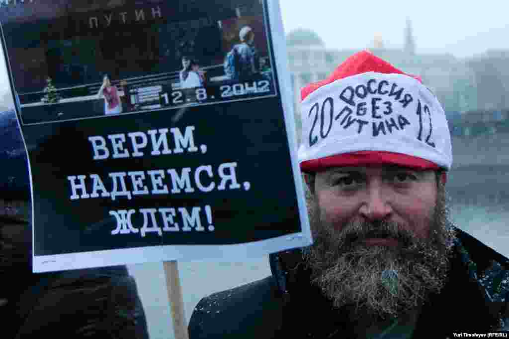 We believe, we hope, we wait&quot; below an image of Lenin&#39;s Mausoleum with Putin&#39;s name on it.