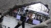 Украина. Донецк. 22 января. На месте обстрела троллейбуса и остановки общественного транспорта 