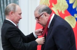 Usmanov, decorat de Putin