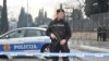 Police block off the area around the U.S. Embassy building in Podgorica after a grenade attack on the facility on February 22. 