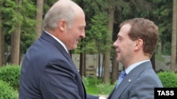 Belarus President Alyaksandr Lukashenka (left) with Russian President Dmitry Medvedev at a meeting in June