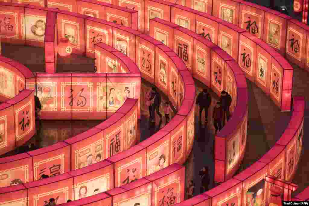 Chinese people walk in a maze at the Tang Paradise Park in Xi'an, Shaanxi Province. (AFP/Fred Dufour)