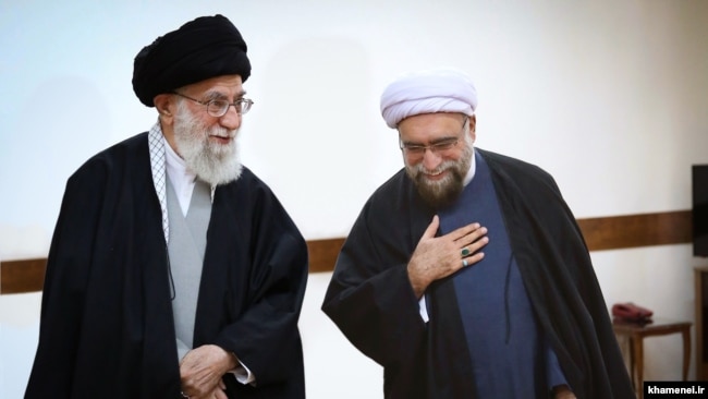 Iran -- Iran's Supreme Leader Ali Khamenei (L) and Ahmad Marvi, his new appointee as the custodian of Astan Quds Razavi.