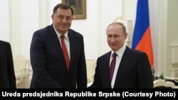 The president of the Bosnian Serb entity Republika Srpska, Milorad Dodik (left), and Russian President Vladimir Putin meet near Moscow on September 22.