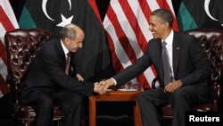 U.S. President Barack Obama (right) meets with Libya's National Transitional Council Chairman Mustafa Abdel Jalil at the United Nations in New York.