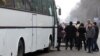 Автобус с людьми, которым за их голоса, по словам ОСДП "Азат", заплатила партия "Нур Отан". Алматы, 15 января 2012 года.