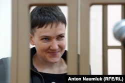 Ukrainian military pilot Nadia Savchenko is seen inside a defendant's cage as she attends a court hearing in the Russian city of Donetsk last week.