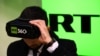 RUSSIA -- A man tries on a VR goggles at the stand of Russia's state-controlled broadcaster RT during the 10th Russian Internet Week in Moscow, November 1, 2017