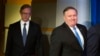File Photo:Secretary of State Mike Pompeo, right, followed by Brian Hook, special representative for Iran, walk to a podium to announce the creation of the Iran Action Group at the State Department, in Washington, Thursday, Aug. 16, 2018.
