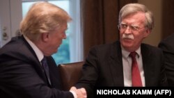 Дональд Трамп и Джон Болтон