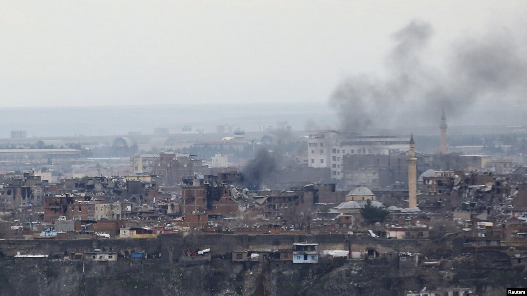 Smoke rises after clashes between Turkish security forces and Kurdish militants in the Sur district of Diyarbakir on February 11.