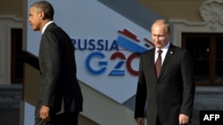 Президент США Барак Обама (слева) и президент России Владимир Путин на саммите "Большой двадцатки". Санкт-Петербург, 5 сентября 2013 года.