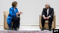 Високиот претставник на ЕУ Кетрин Ештон и шефот на иранската дипломатија Мохамад Џавад Зариф, Женева 15.10.2013.